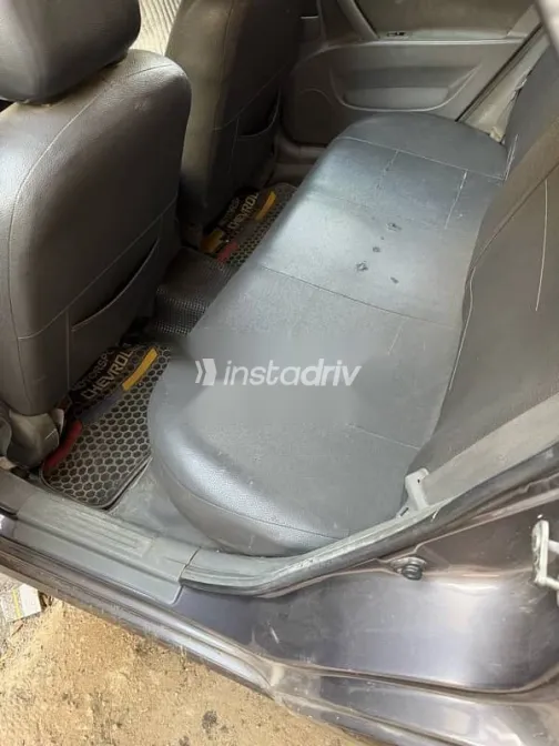 شيفروليه أوبترا 2011 رمادي مستعملة للبيع - 4