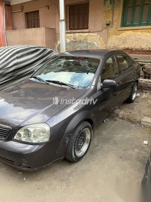 شيفروليه أوبترا 2011 رمادي مستعملة للبيع - 7