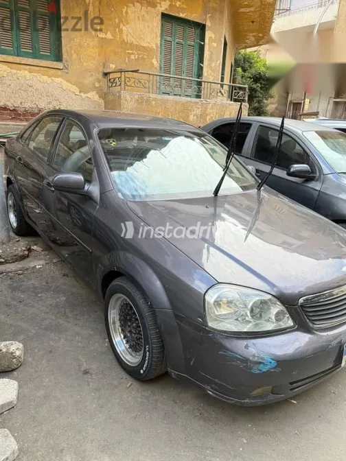 شيفروليه أوبترا 2011 رمادي مستعملة للبيع - 9