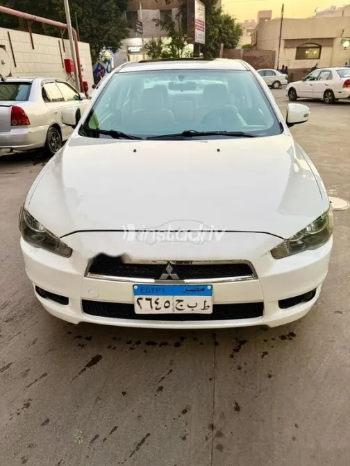 ميتسوبيشي لانسر اى اكس شارك 2016 أبيض مستعملة للبيع - 4
