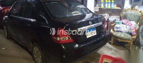 نيسان تيدا 2009 أسود مستعملة للبيع - 4