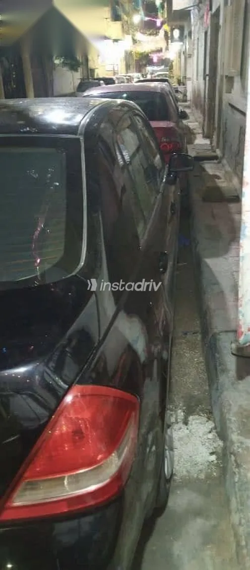 نيسان تيدا 2009 أسود مستعملة للبيع - 5