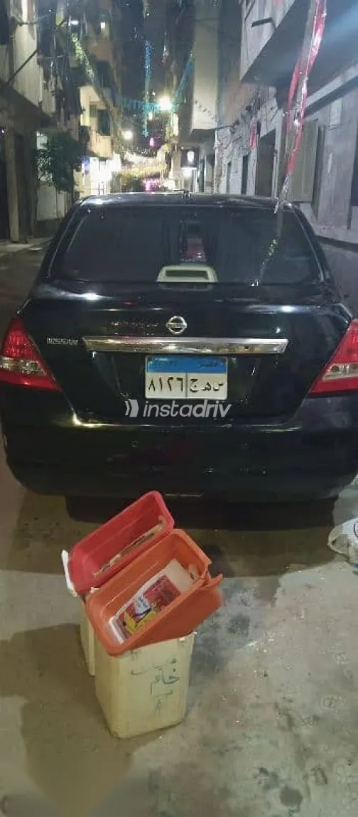 نيسان تيدا 2009 أسود مستعملة للبيع - 7