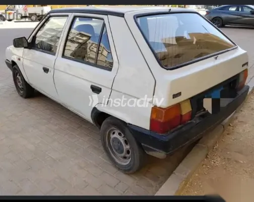 سكودا فيفوريت 1994 أبيض مستعملة للبيع - 5