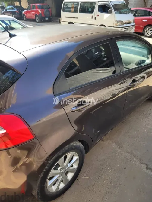 كيا ريو 2015 بني مستعملة للبيع - 7