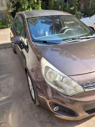 كيا ريو 2015 بني مستعملة للبيع