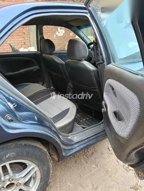 ميتسوبيشي لانسر 1999 أزرق غامق مستعملة للبيع - 4