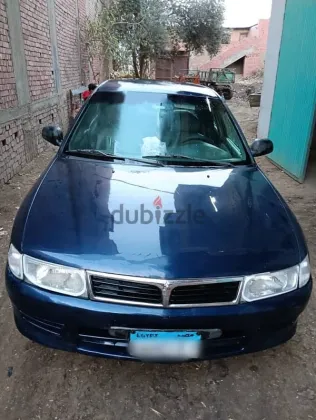 ميتسوبيشي لانسر 1999 أزرق غامق مستعملة للبيع