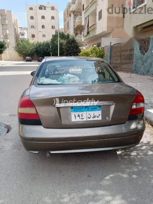 دايو نوبيرا 2002 رمادي مستعملة للبيع - 5