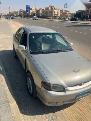 هيونداي اكسنت 2002 فضي مستعملة للبيع