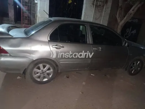 ميتسوبيشي لانسر 2007 فضي مستعملة للبيع - 7