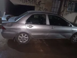 ميتسوبيشي لانسر 2007 فضي مستعملة للبيع