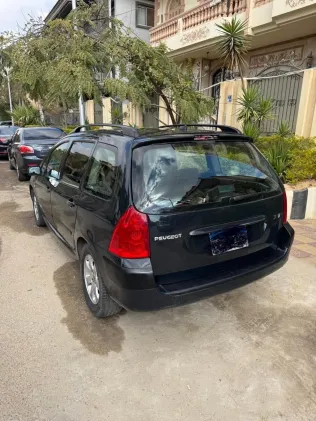 بيجو 307 2006 أبيض مستعملة للبيع