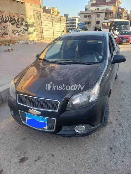 شيفروليه افيو 2016 أسود مستعملة للبيع - 1