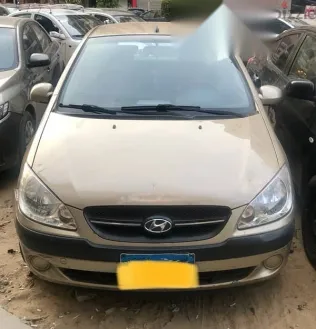 هيونداي جيتز 2010 ذهبي مستعملة للبيع