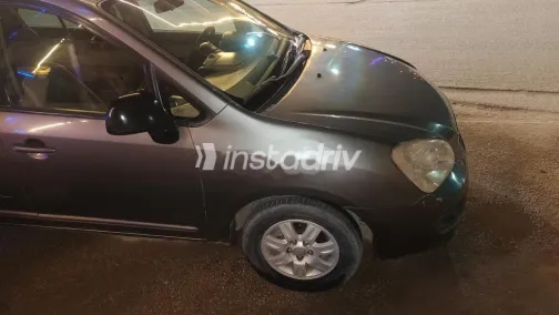 كيا كارينز 2010 رمادي غامق مستعملة للبيع - 5