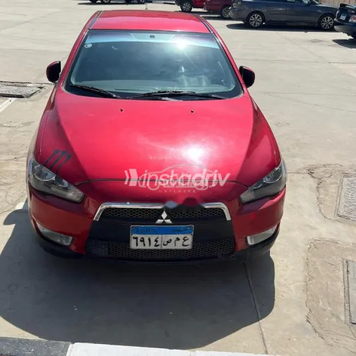 ميتسوبيشي لانسر اى اكس شارك 2015 أحمر غامق مستعملة للبيع - 2