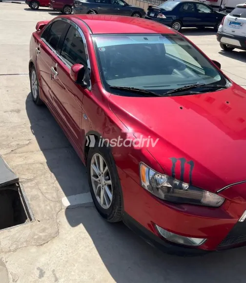 ميتسوبيشي لانسر اى اكس شارك 2015 أحمر غامق مستعملة للبيع - 3