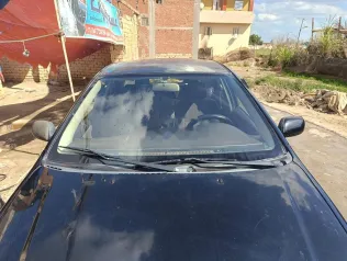 تويوتا كورولا 2005 أسود مستعملة للبيع