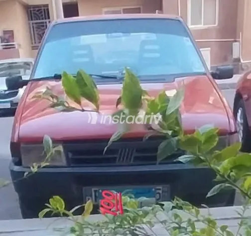 فيات اونو 1990 أحمر مستعملة للبيع - 1