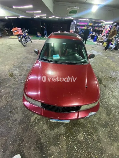 ميتسوبيشي ميراج 1999 أحمر مستعملة للبيع - 4