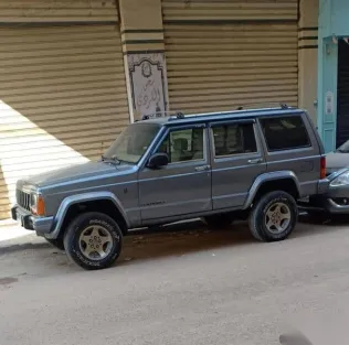 جيب شيروكي 1995 رمادي مستعملة للبيع