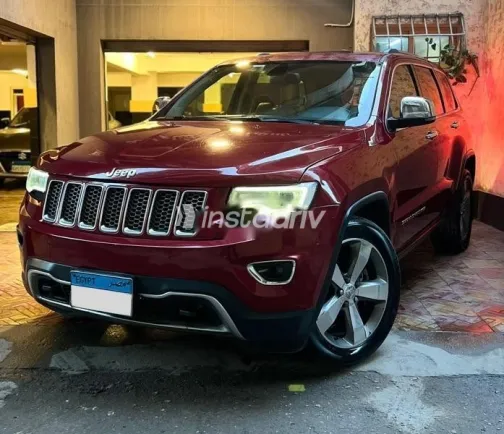 جيب جراند شيروكي 2014 أحمر مستعملة للبيع - 1
