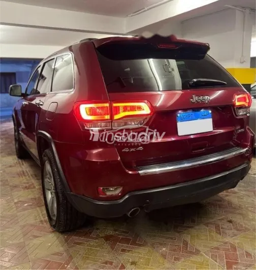 جيب جراند شيروكي 2014 أحمر مستعملة للبيع - 3