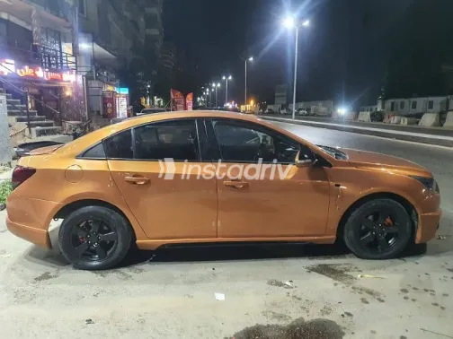 شيفروليه كروز 2010 ذهبي مستعملة للبيع - 1