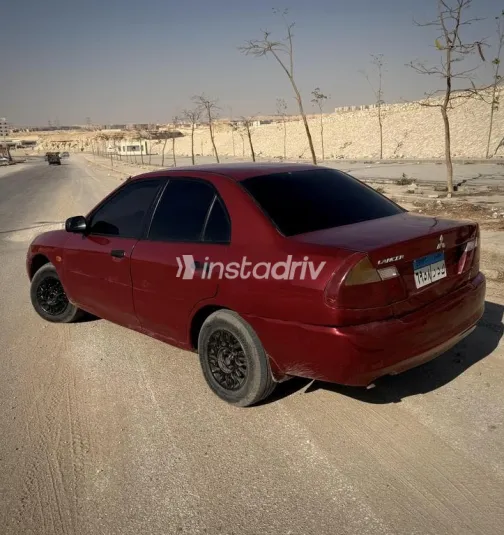 ميتسوبيشي لانسر كرستالة 1997 أحمر غامق مستعملة للبيع - 2