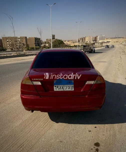 ميتسوبيشي لانسر كرستالة 1997 أحمر غامق مستعملة للبيع - 4