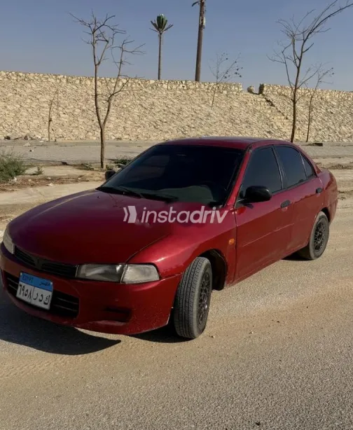ميتسوبيشي لانسر كرستالة 1997 أحمر غامق مستعملة للبيع - 5