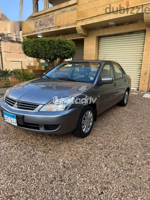 ميتسوبيشي لانسر 2013 رمادي مستعملة للبيع - 1