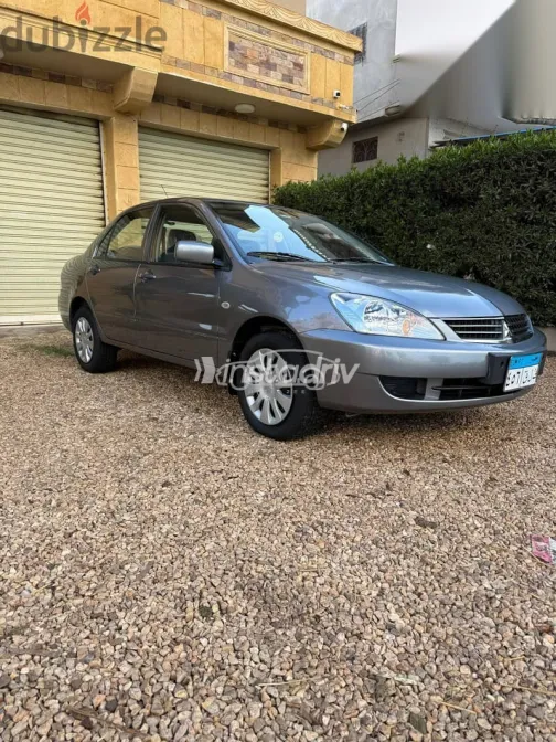 ميتسوبيشي لانسر 2013 رمادي مستعملة للبيع - 2