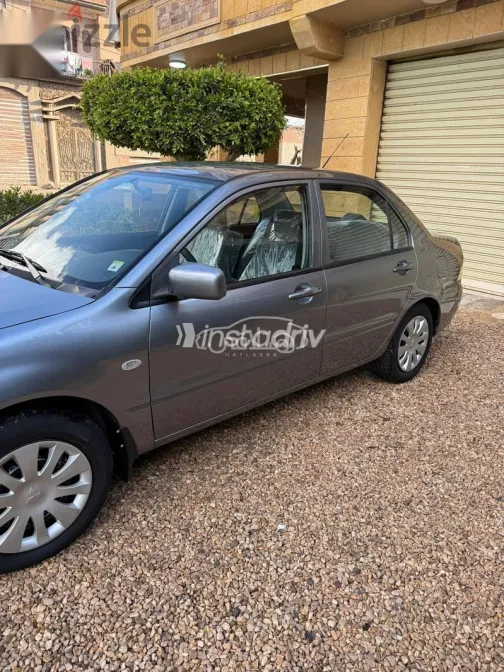 ميتسوبيشي لانسر 2013 رمادي مستعملة للبيع - 6