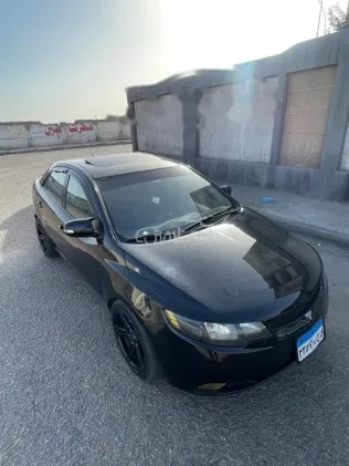 كيا سيراتو 2010 أسود مستعملة للبيع