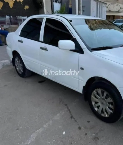 ميتسوبيشي لانسر بومة 2014 أبيض مستعملة للبيع - 2