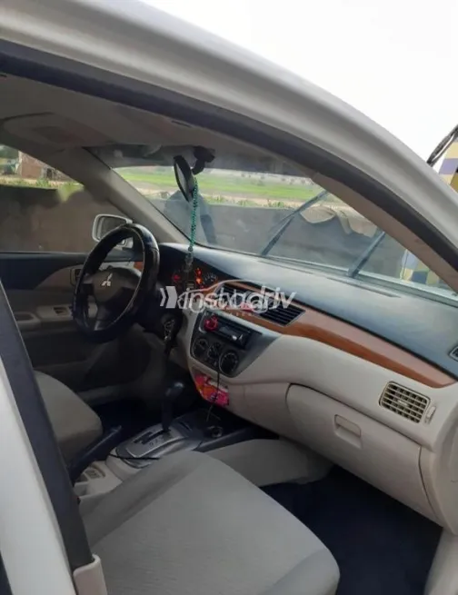 ميتسوبيشي لانسر بومة 2014 أبيض مستعملة للبيع - 4