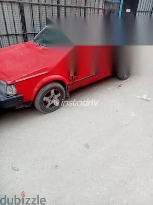 مازدا 323 1983 أحمر مستعملة للبيع - 1