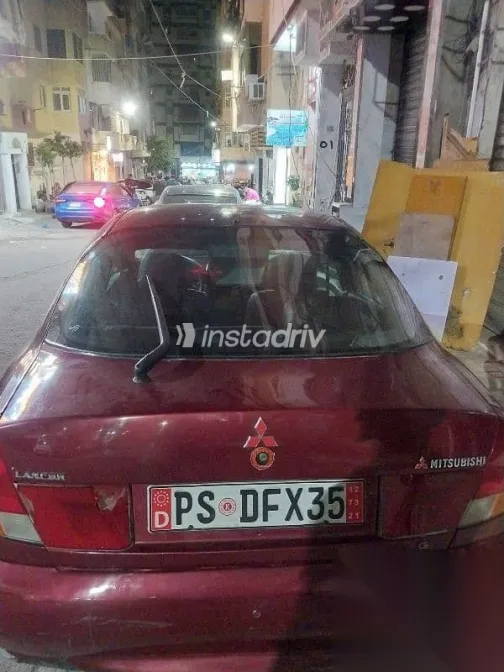 ميتسوبيشي لانسر 1996 أحمر مستعملة للبيع - 4