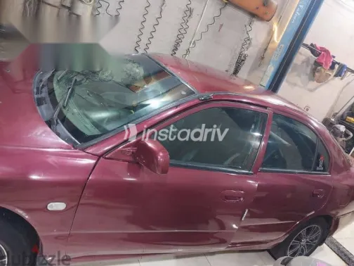 ميتسوبيشي لانسر 1996 أحمر مستعملة للبيع - 5