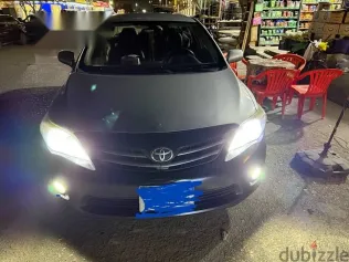 تويوتا كورولا 2013 رمادي مستعملة للبيع