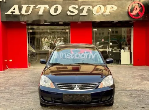 ميتسوبيشي لانسر 2013 أزرق غامق مستعملة للبيع - 1