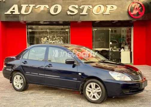 ميتسوبيشي لانسر 2013 أزرق غامق مستعملة للبيع - 5