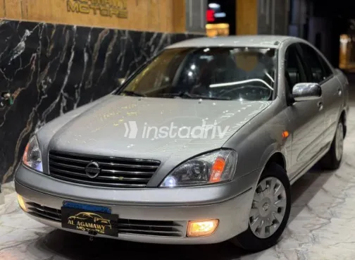 نيسان صنى 2010 فضي مستعملة للبيع - 5