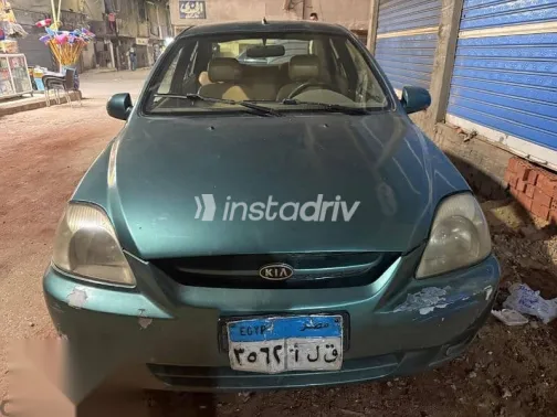 كيا ريو 2003 أخضر مستعملة للبيع - 1