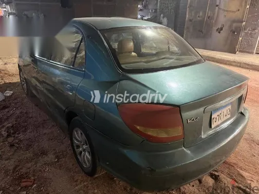 كيا ريو 2003 أخضر مستعملة للبيع - 2