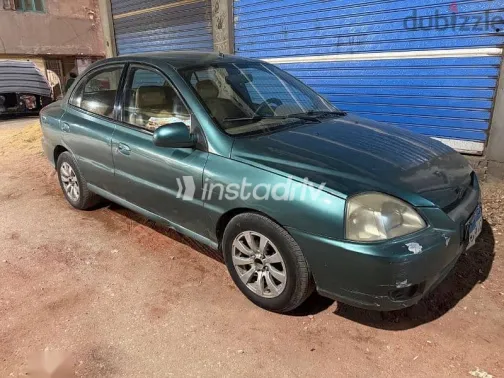 كيا ريو 2003 أخضر مستعملة للبيع - 6