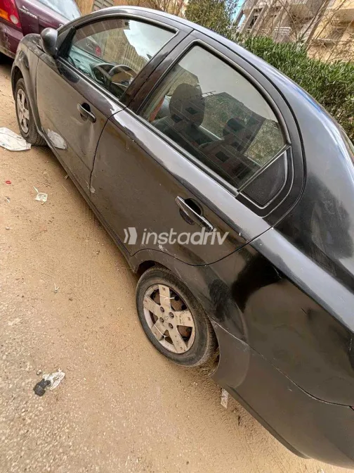 شيفروليه افيو 2009 أبيض مستعملة للبيع - 4