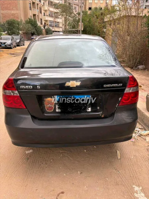 شيفروليه افيو 2009 أبيض مستعملة للبيع - 8